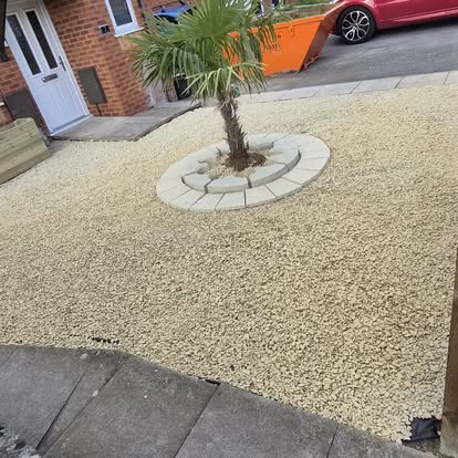 Front garden landscaping with decorative stone